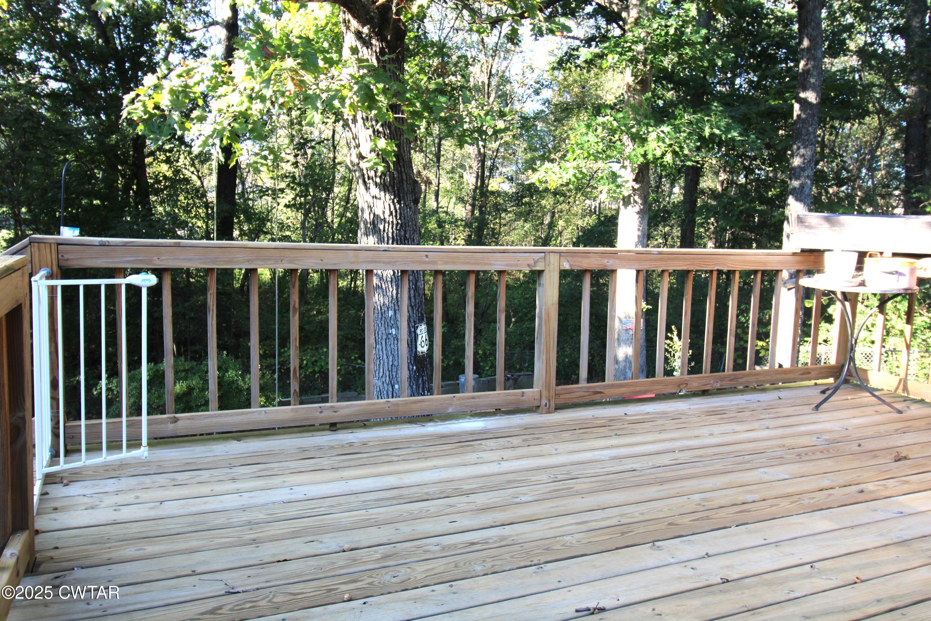311 Elizabeth Circle Lexington, TN 38351 - Photo 20 of 23 a view of a wooden deck