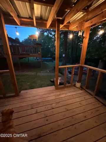 a view of sitting area with view of swimming pool