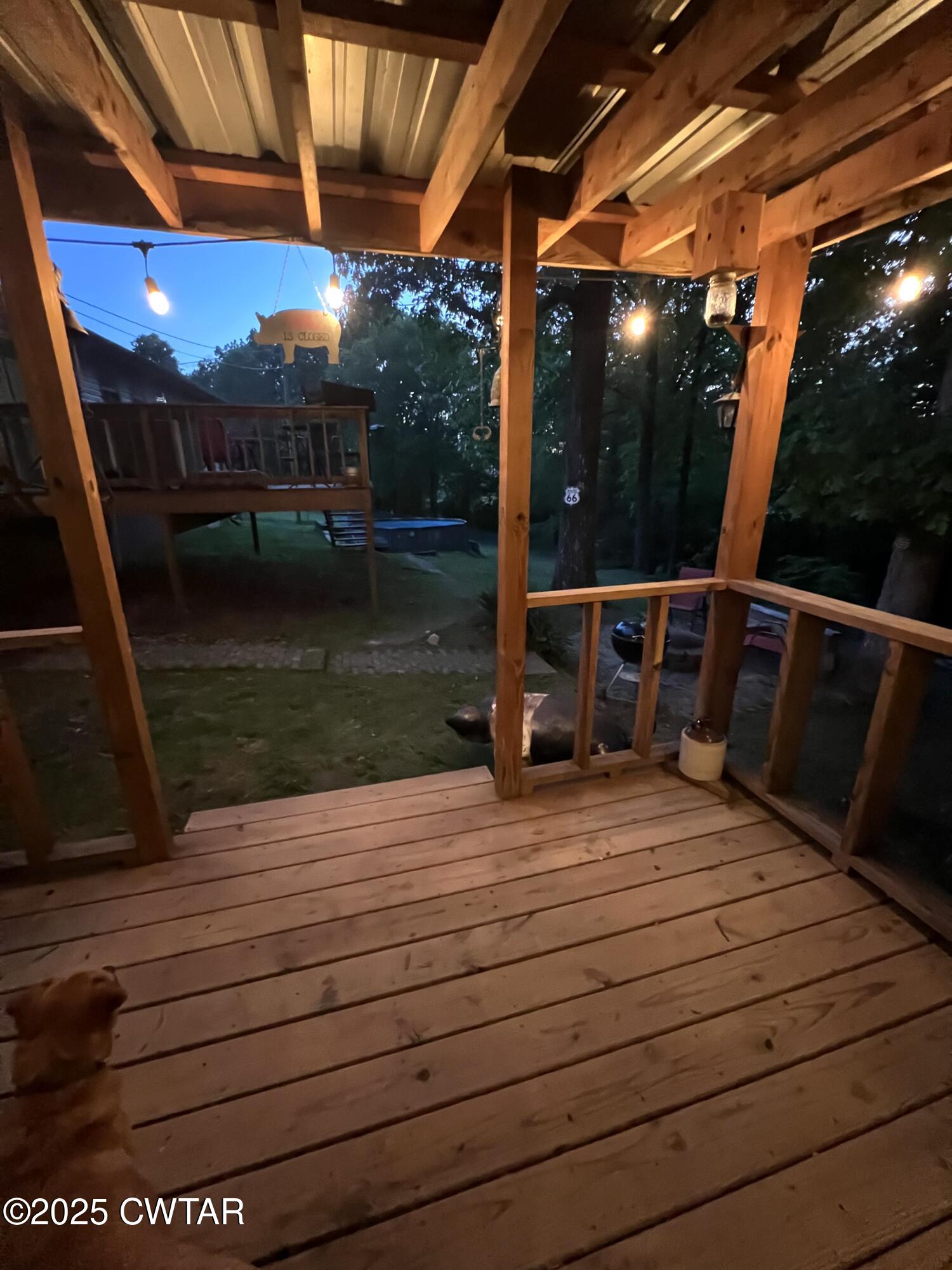 311 Elizabeth Circle Lexington, TN 38351 - Photo 21 of 23 a view of sitting area with view of swimming pool