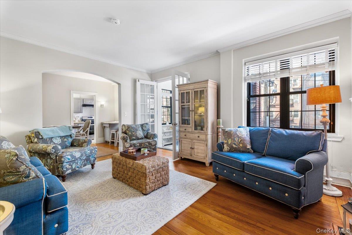 824 Bronx River Road, Unit 3A Bronxville, NY 10708 - Photo 25 of 26 Living Room with tons of natural light. Open floor plan with archway to the Dining Room