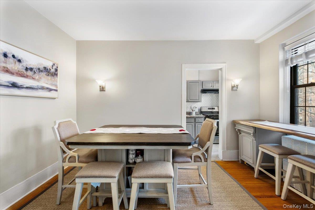 824 Bronx River Road, Unit 3A Bronxville, NY 10708 - Photo 8 of 26 Dining room has space for a table and a bar stool seating area