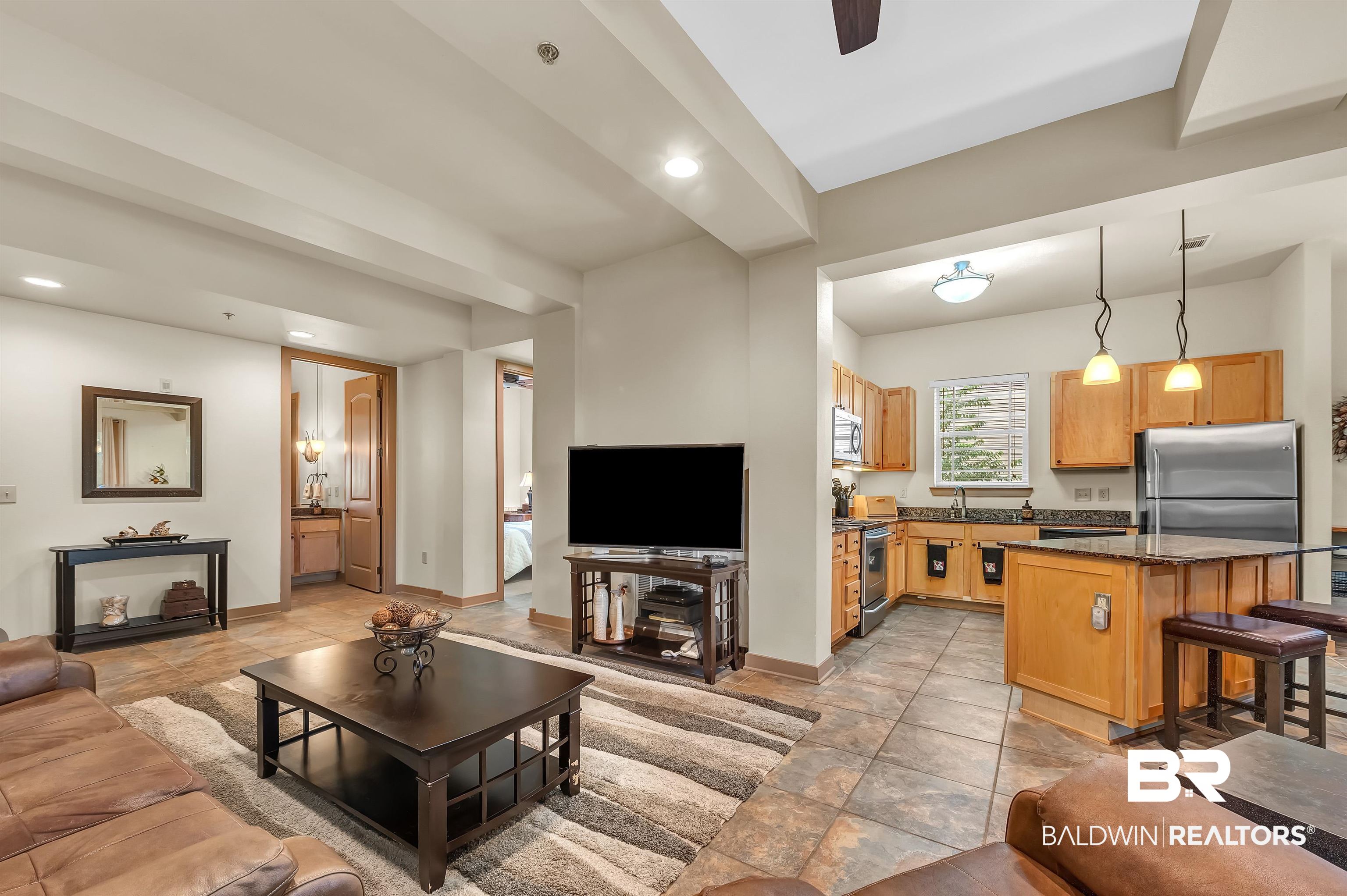 1430 Regency Road, Unit C201 Gulf Shores, AL 36542 - Photo 28 of 54 Living room with recessed lighting and ceiling fan