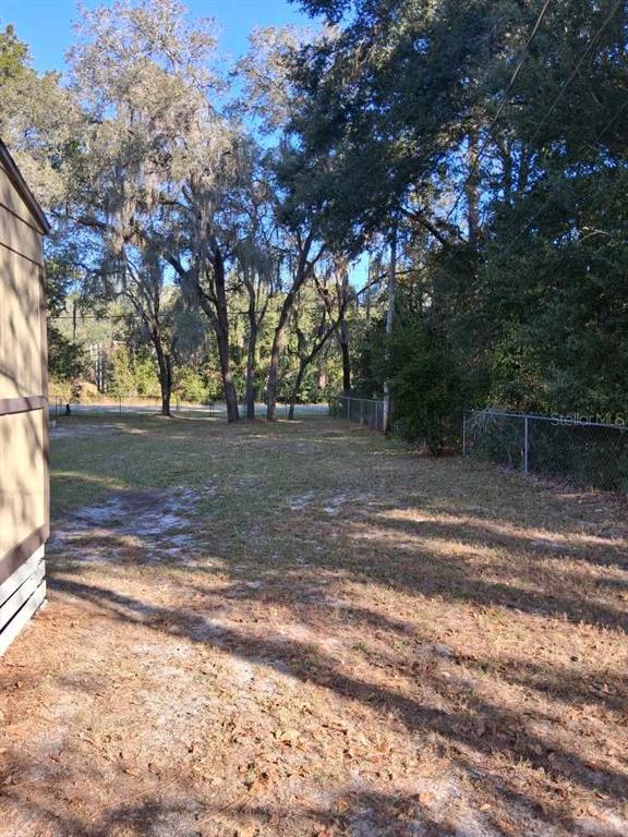6332 West Homosassa Trail Homosassa, FL 34448 - Photo 13 of 13 a view of a yard with large trees