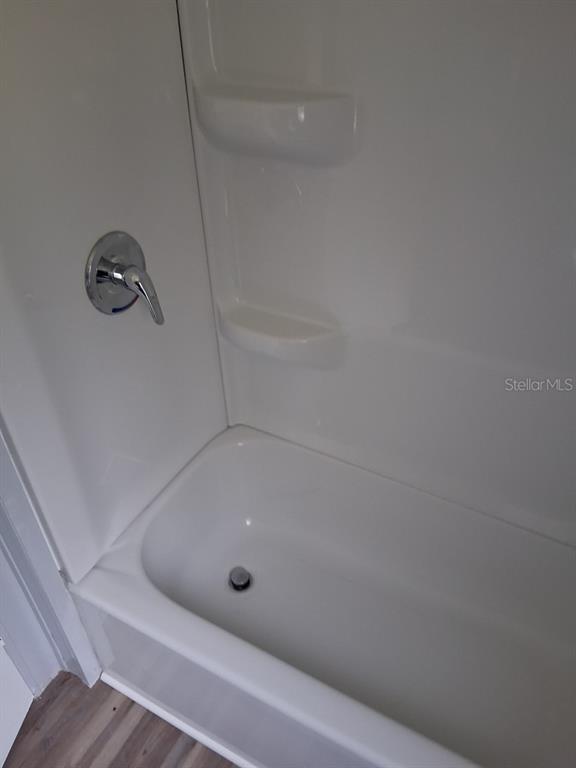 6332 West Homosassa Trail Homosassa, FL 34448 - Photo 5 of 13 a bathroom with a bath tub and a shower