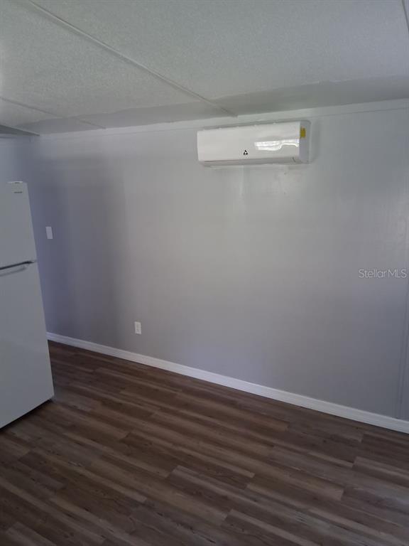 6332 West Homosassa Trail Homosassa, FL 34448 - Photo 9 of 13 a view of an empty room with wooden floor