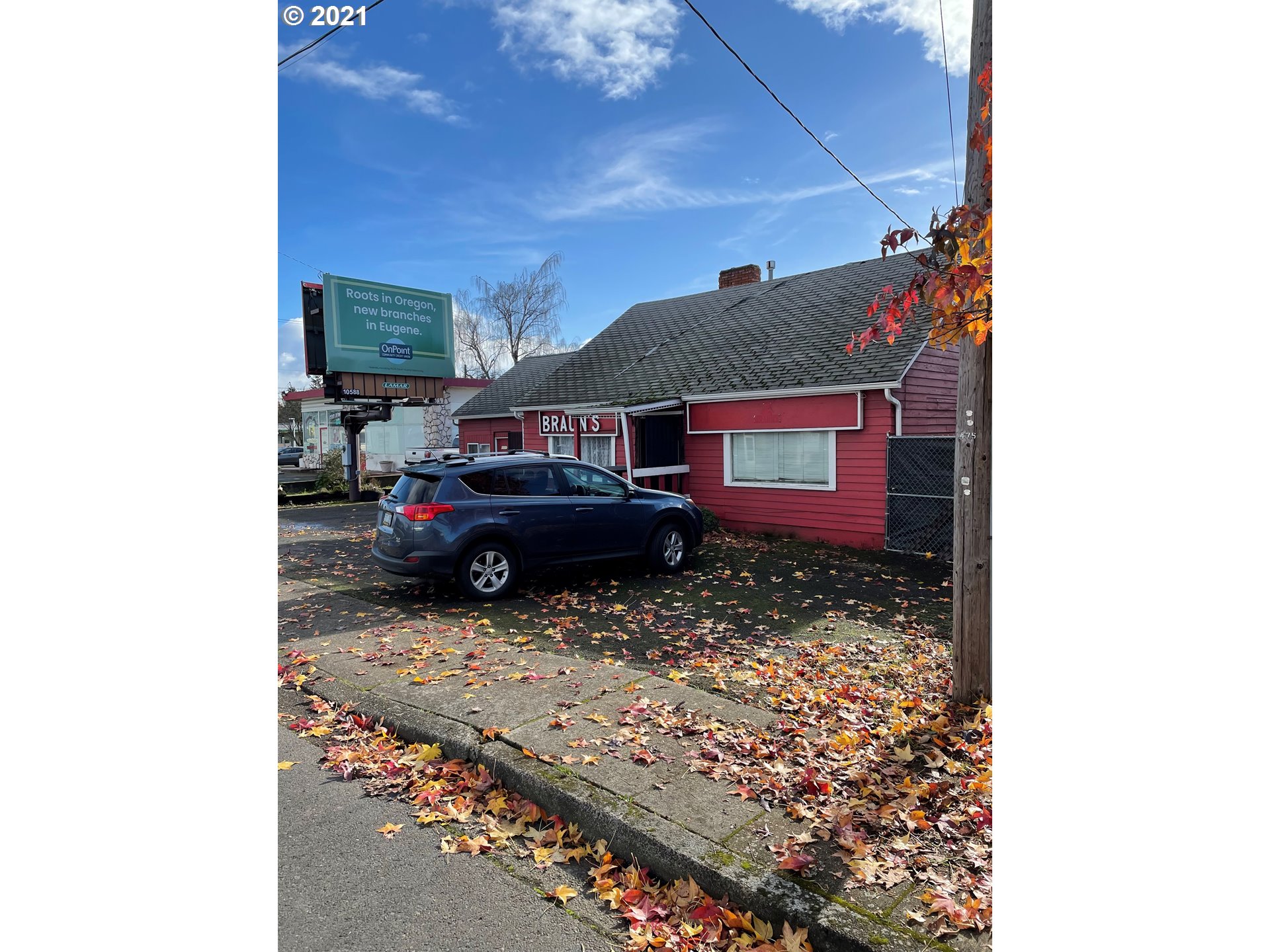 439 Q Street Springfield, OR 97477 - Photo 1 of 18 a car parked in front of a house