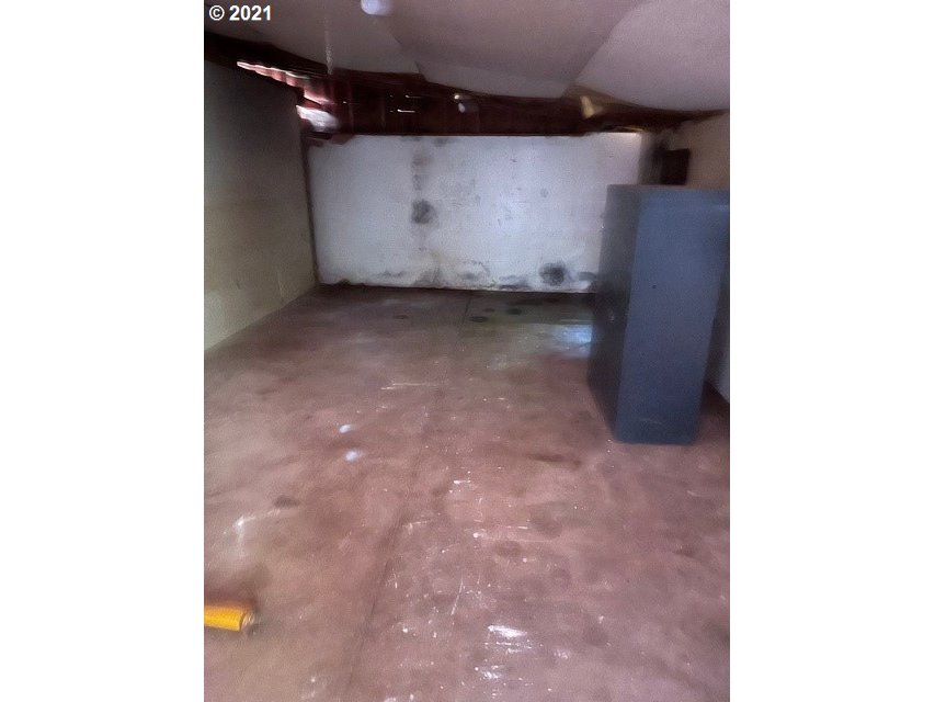 439 Q Street Springfield, OR 97477 - Photo 14 of 18 a view of a refrigerator in a room