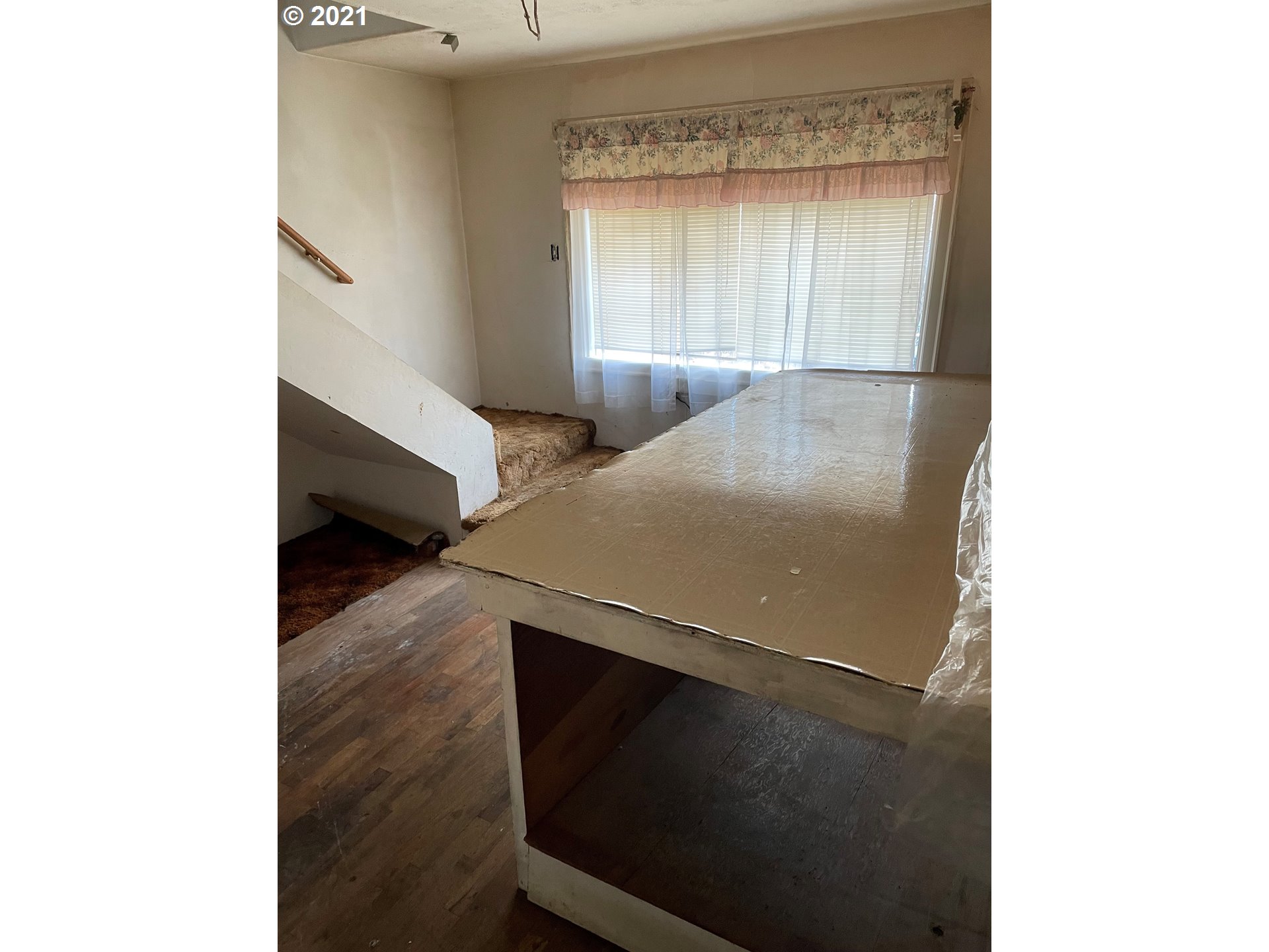 439 Q Street Springfield, OR 97477 - Photo 5 of 18 a living room with a wooden floor
