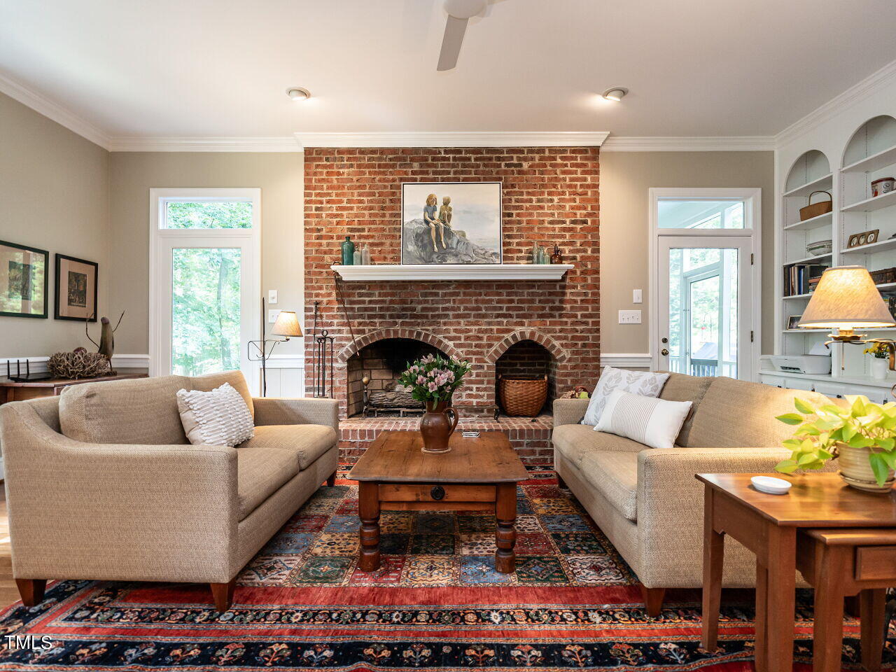 10711 Dunhill Terrace Raleigh, NC 27615 - Photo 4 of 28 a living room with furniture and a fireplace