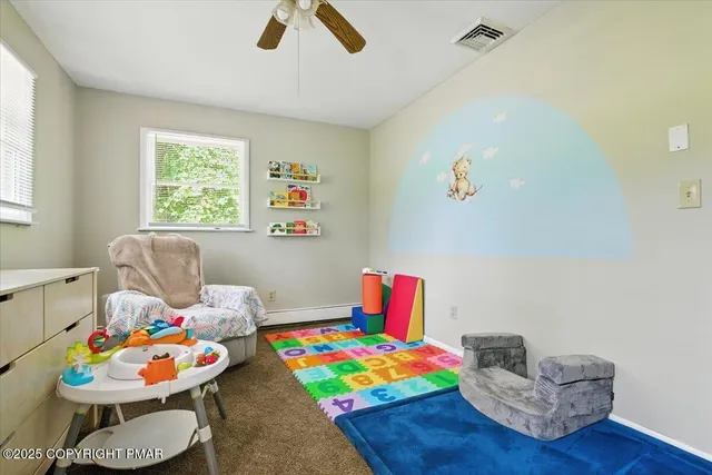 a view of a garage with sitting area