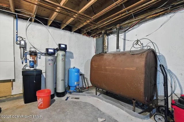 a balcony with furniture and a potted plant