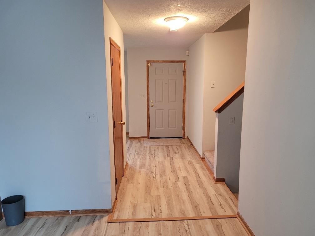 960 South Trainer Road Rockford, IL 61108 - Photo 11 of 31 a view of a hallway with wooden floor