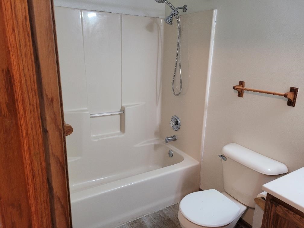 960 South Trainer Road Rockford, IL 61108 - Photo 19 of 31 a white toilet sitting next to a bath tub