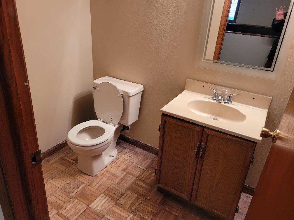960 South Trainer Road Rockford, IL 61108 - Photo 28 of 31 a white toilet sitting next to a bathroom sink