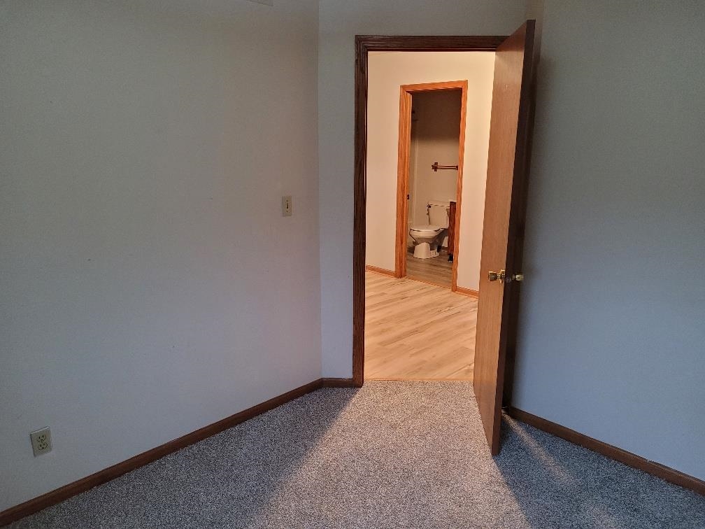 960 South Trainer Road Rockford, IL 61108 - Photo 10 of 31 a view of a hallway with a room