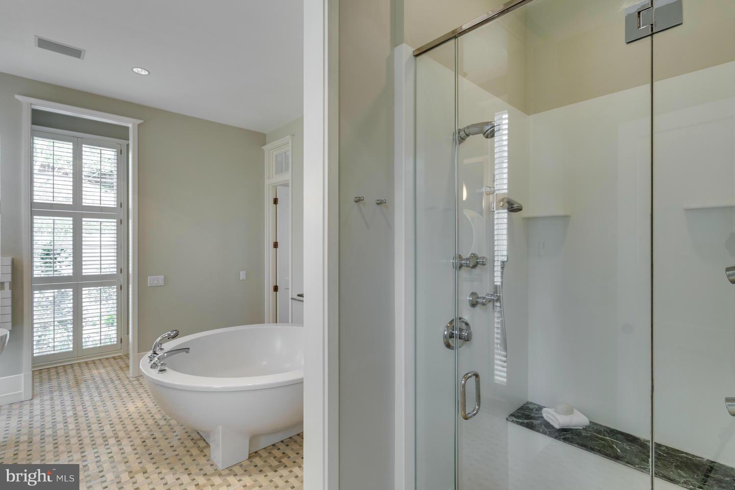 1300 Ranleigh Road McLean, VA 22101 - Photo 14 of 30 a bathroom with a bathtub and a shower