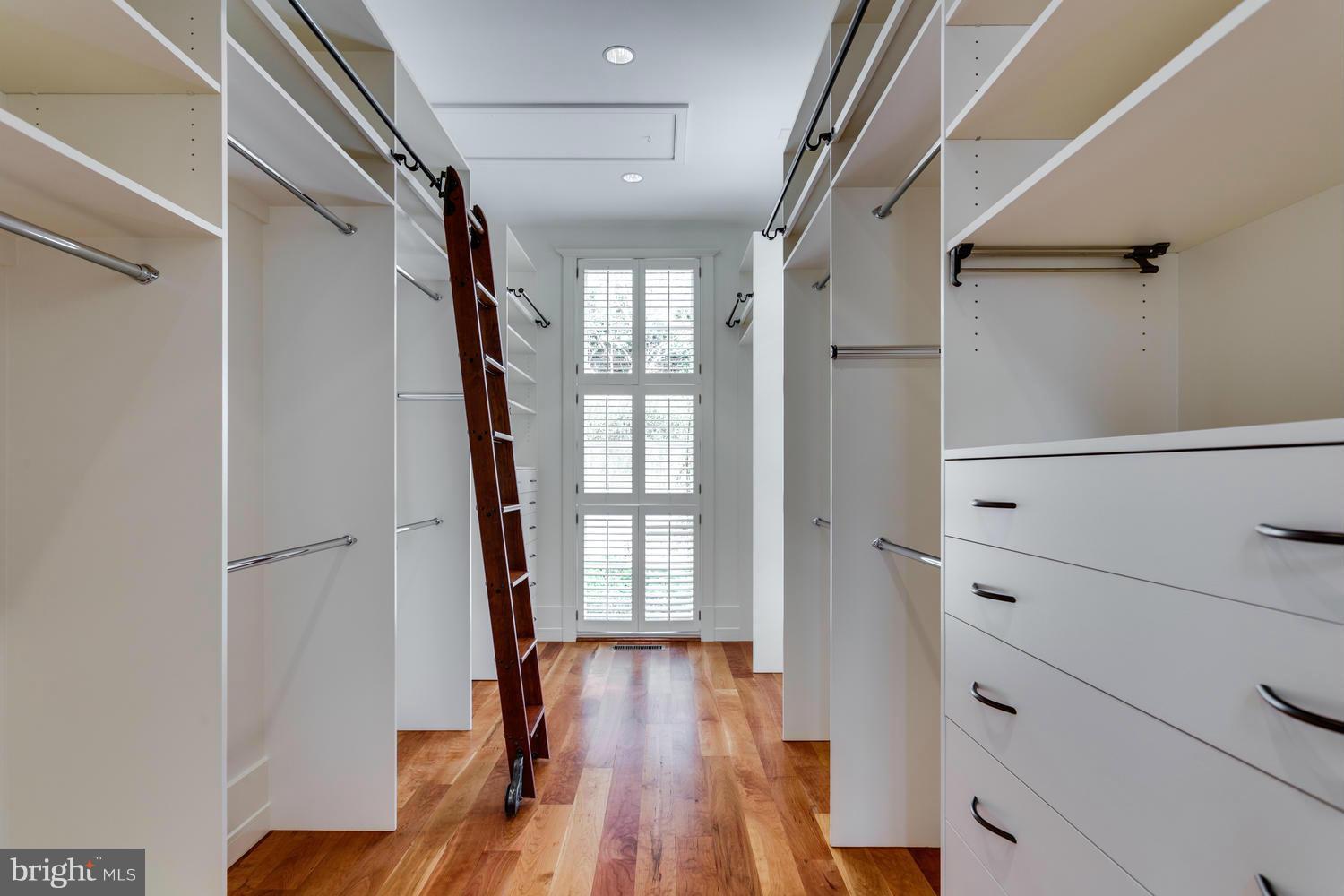 1300 Ranleigh Road McLean, VA 22101 - Photo 16 of 30 a view of walk in closet with empty racks
