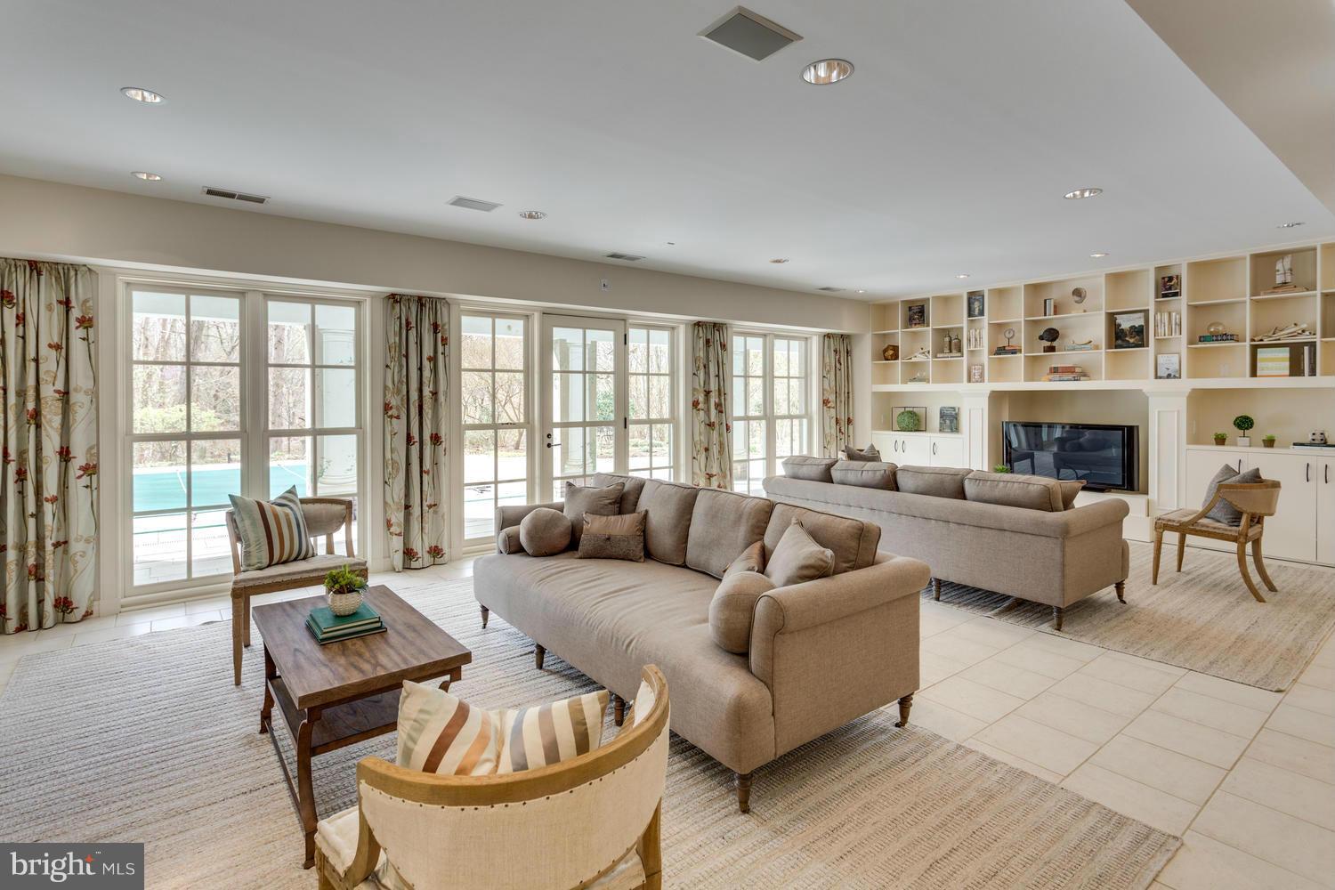 1300 Ranleigh Road McLean, VA 22101 - Photo 21 of 30 a living room with furniture and a fireplace