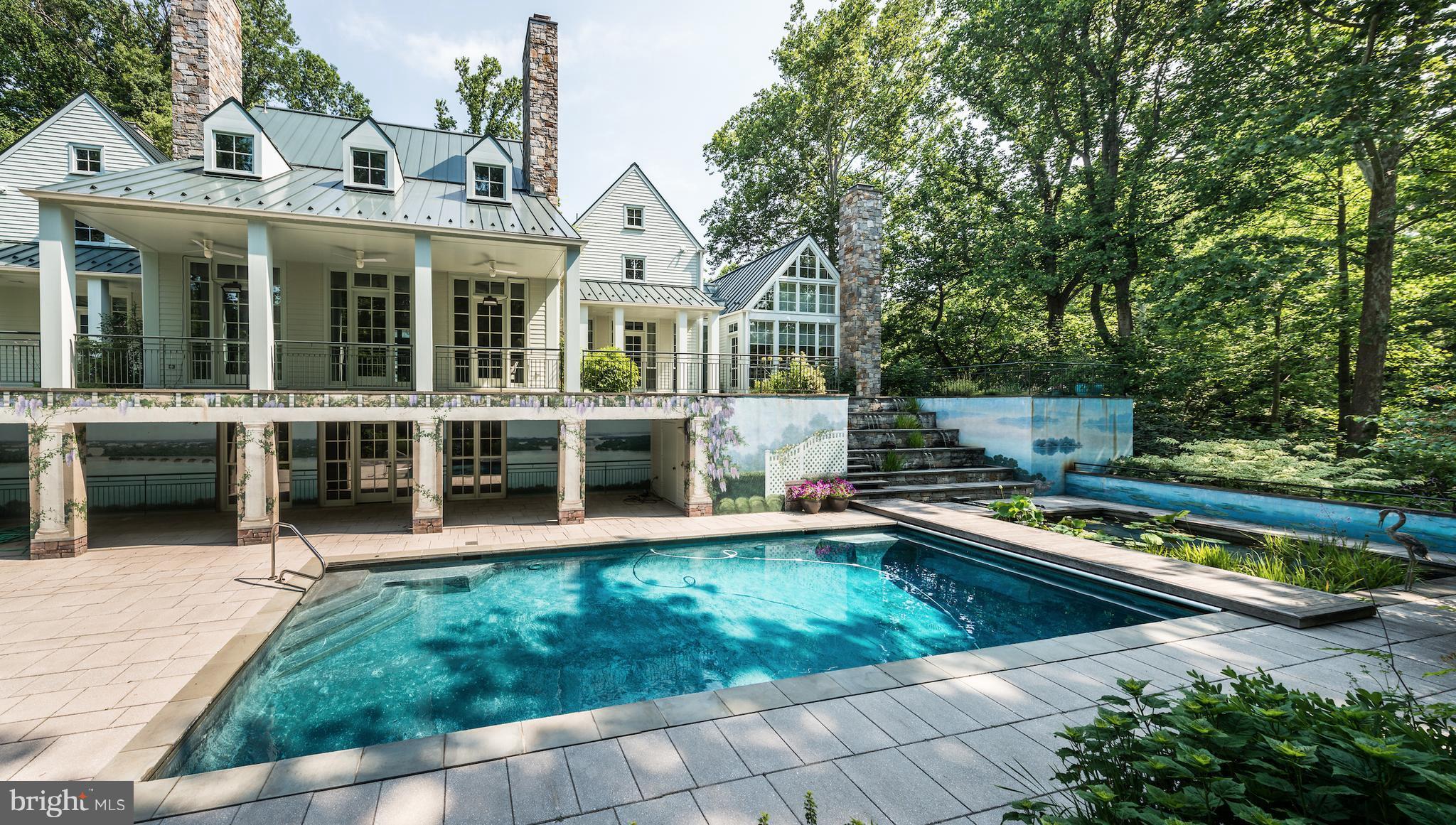 1300 Ranleigh Road McLean, VA 22101 - Photo 24 of 30 a view of a house with pool and sitting area