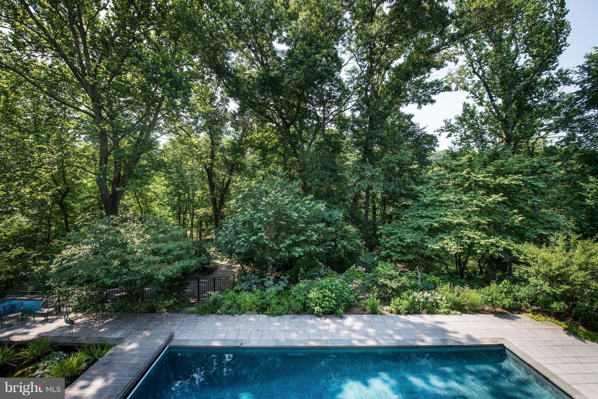 1300 Ranleigh Road McLean, VA 22101 - Photo 25 of 30 a view of backyard with swimming pool and seating space