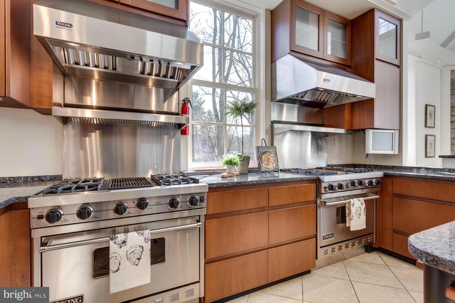 1300 Ranleigh Road McLean, VA 22101 - Photo 8 of 30 a white stove top oven sitting inside of a kitchen