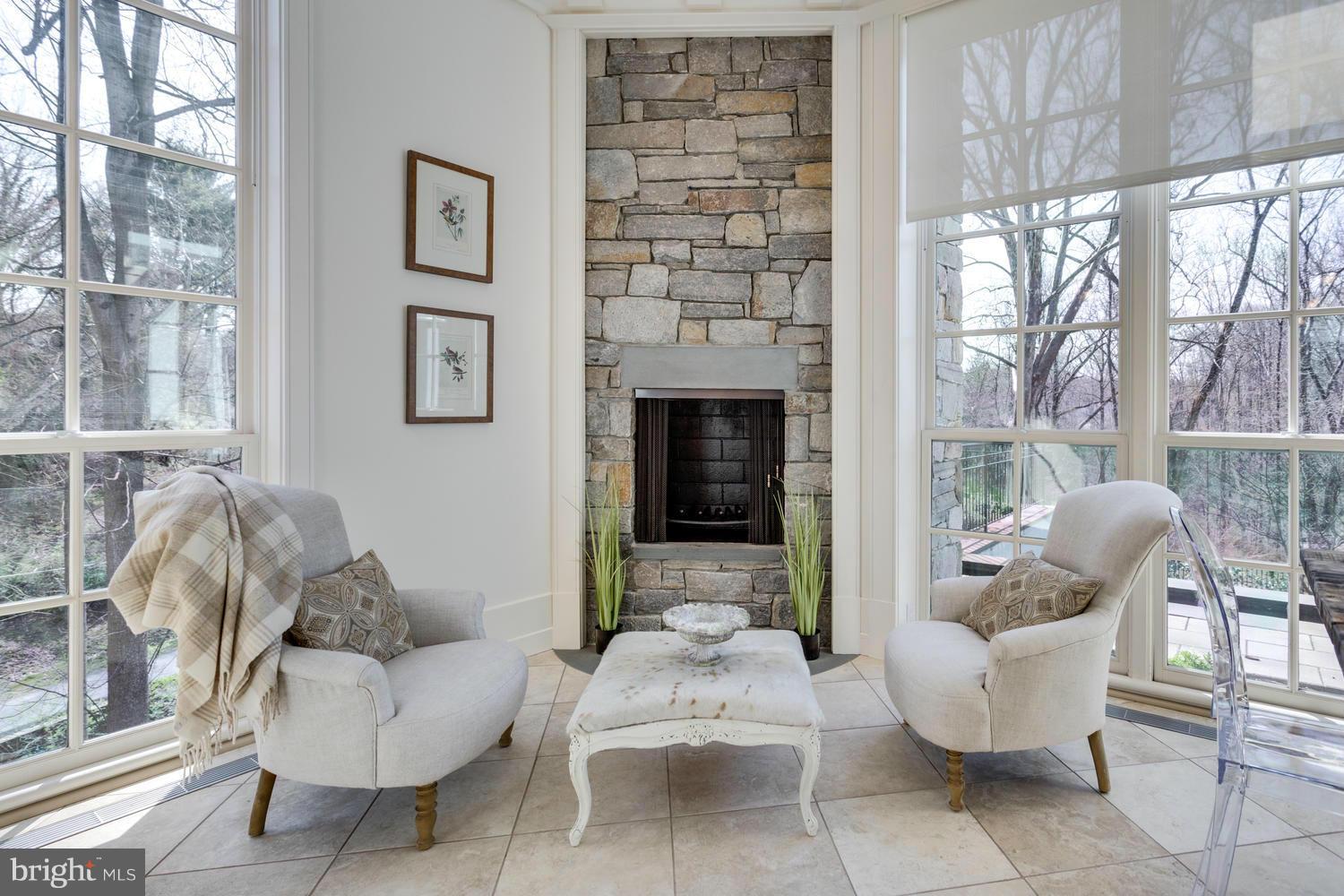 1300 Ranleigh Road McLean, VA 22101 - Photo 9 of 30 a living room with furniture and a fireplace