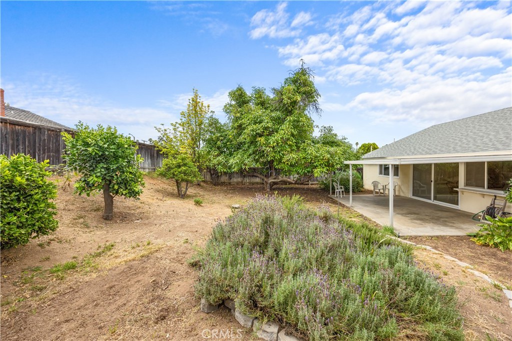 3430 Bahia Place Riverside, CA 92507 - Photo 30 of 34 a view of a house with a yard