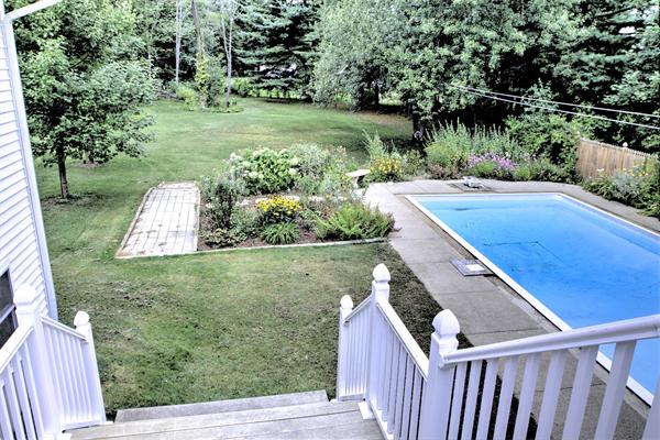 7 Reid Road Chelmsford, MA 01824 - Photo 26 of 30 a view of a backyard with pathway