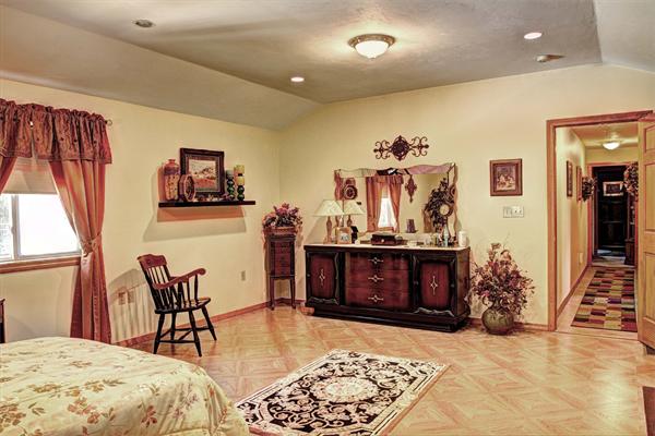 7 Reid Road Chelmsford, MA 01824 - Photo 8 of 30 a bedroom with furniture and wooden floor
