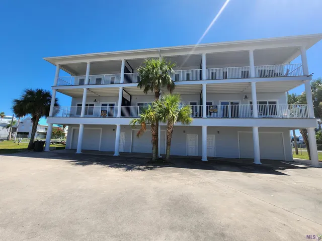 $490,000 | 411 Admiral Craik Drive, Unit 7, Grand Isle, LA 70358