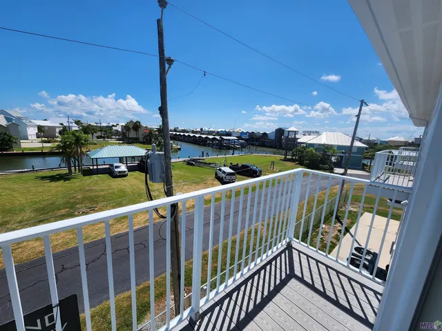 $490,000 | 411 Admiral Craik Drive, Unit 7, Grand Isle, LA 70358