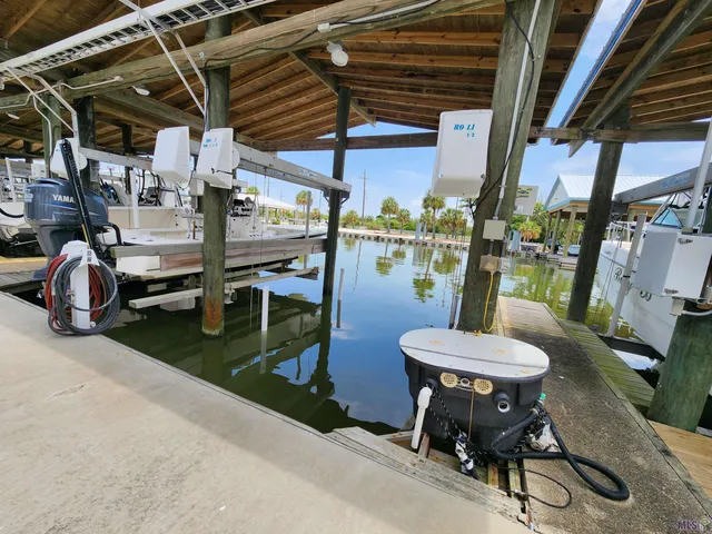 $490,000 | 411 Admiral Craik Drive, Unit 7, Grand Isle, LA 70358