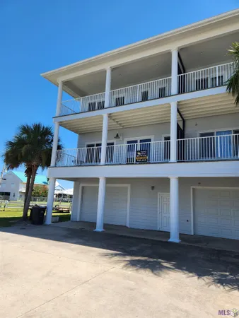 $490,000 | 411 Admiral Craik Drive, Unit 7, Grand Isle, LA 70358