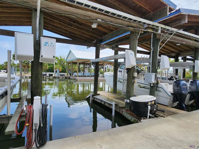 $490,000 | 411 Admiral Craik Drive, Unit 7, Grand Isle, LA 70358