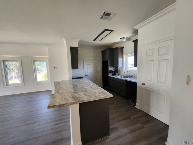 $490,000 | 411 Admiral Craik Drive, Unit 7, Grand Isle, LA 70358