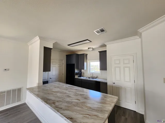 $490,000 | 411 Admiral Craik Drive, Unit 7, Grand Isle, LA 70358