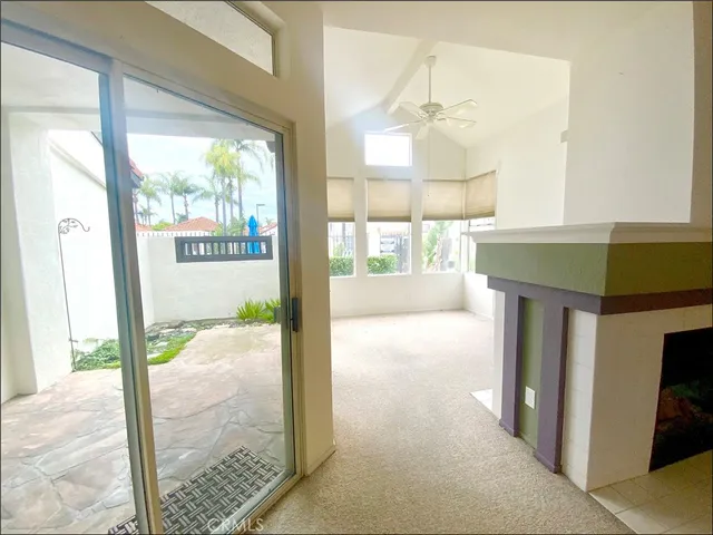 a kitchen that has a sink a stove and a refrigerator