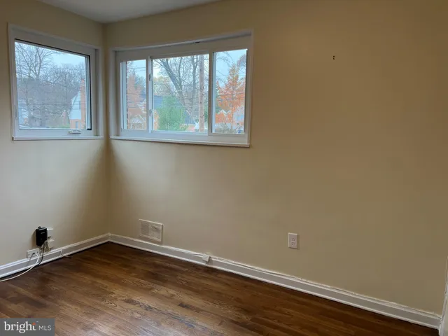 a bathroom with a toilet and shower
