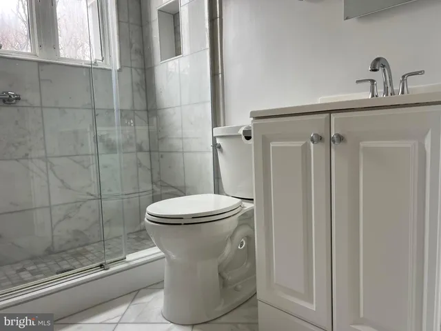 a front view of a house with yard