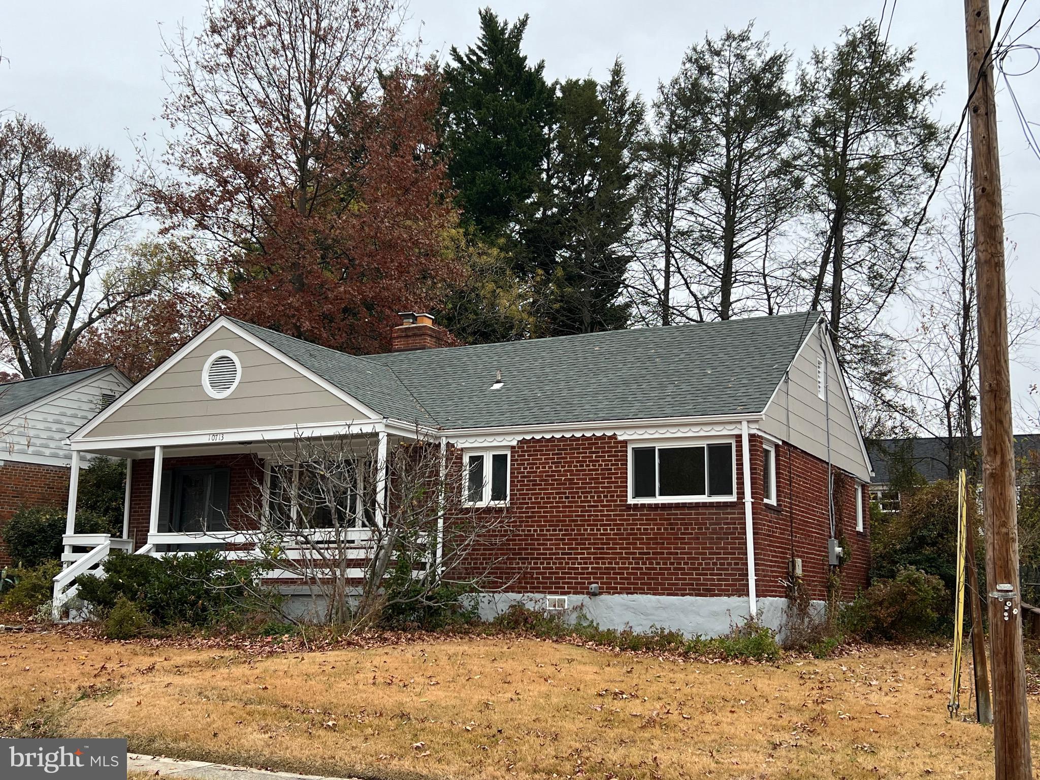 10713 St Margarets Way Silver Spring, MD 20902 - Photo 2 of 20 a front view of a house with garden