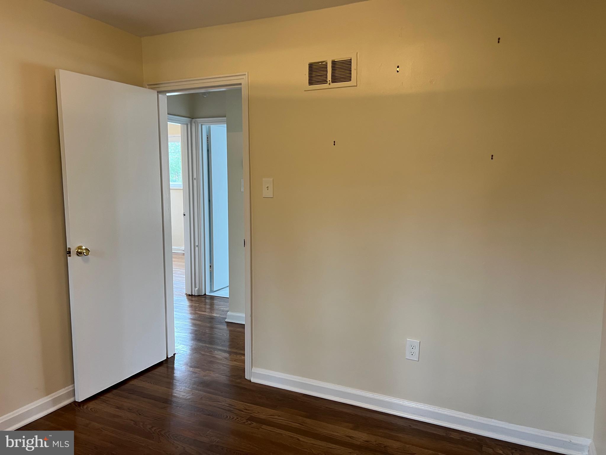 10713 St Margarets Way Silver Spring, MD 20902 - Photo 7 of 20 a view of a small space with wooden floor