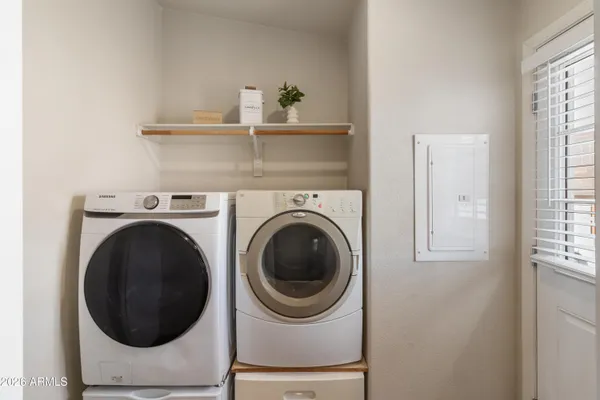 a utility room with dryer and washer