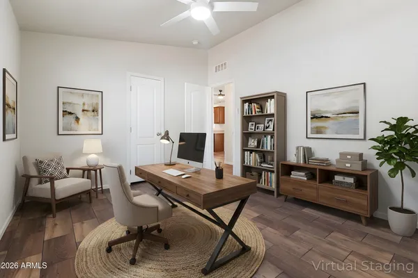 a workspace with furniture and window