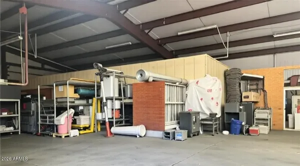 a view of a room with racks on the wall