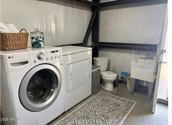 a bed room with a bed and a couch