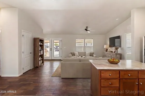 a view of living room with granite countertop furniture and fireplace