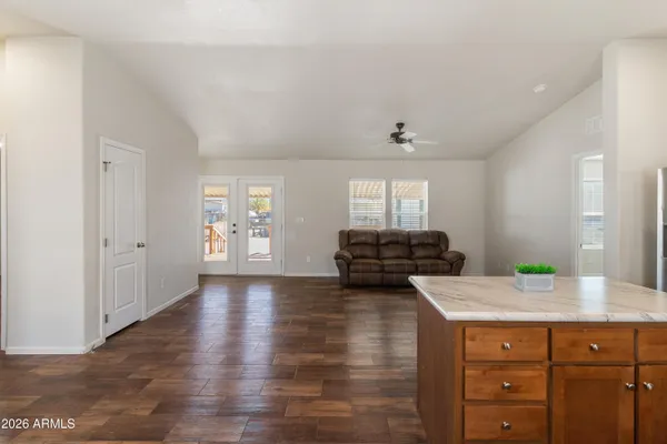 a kitchen with sink and cabinets