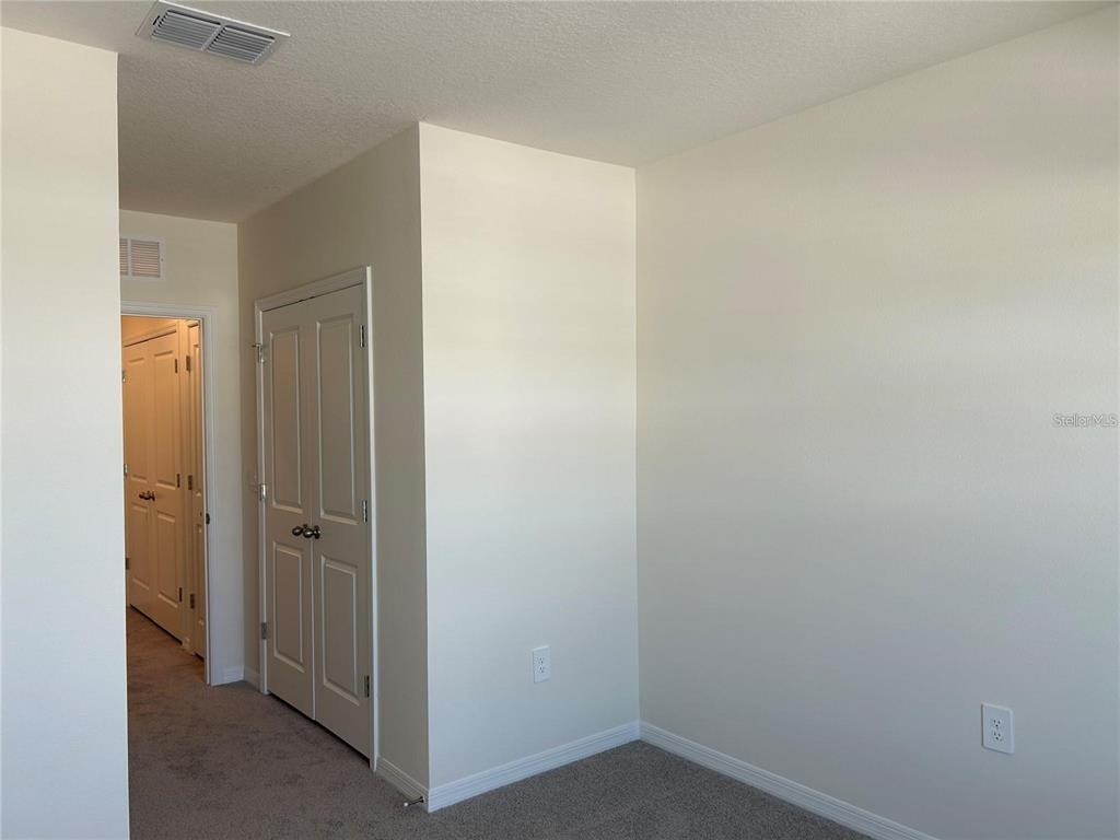 17550 Crescent Moon Loop Bradenton, FL 34211 - Photo 28 of 36 a view of an empty room