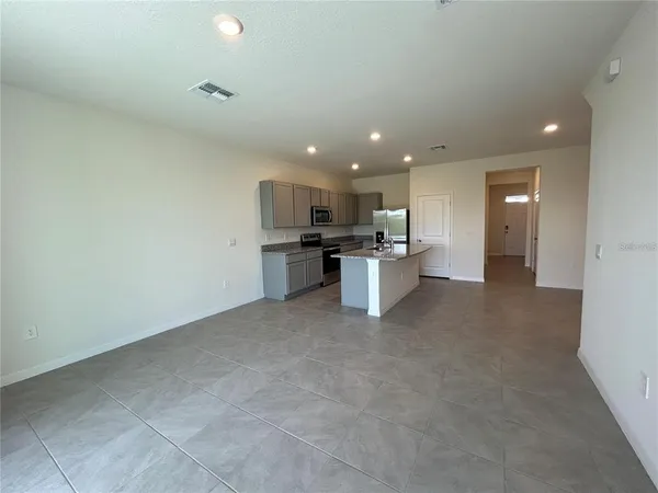 a view of a kitchen with a sink