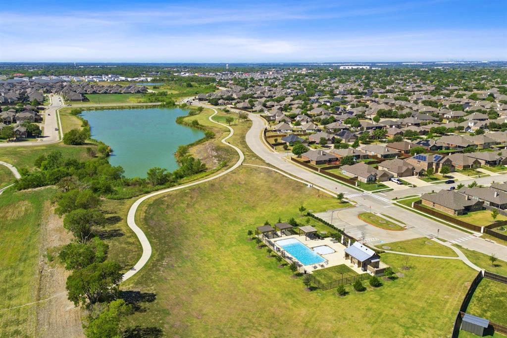 507 Pinnacles Court Forney, TX 75126 - Photo 29 of 31 an aerial view of residential houses with outdoor space and ocean view
